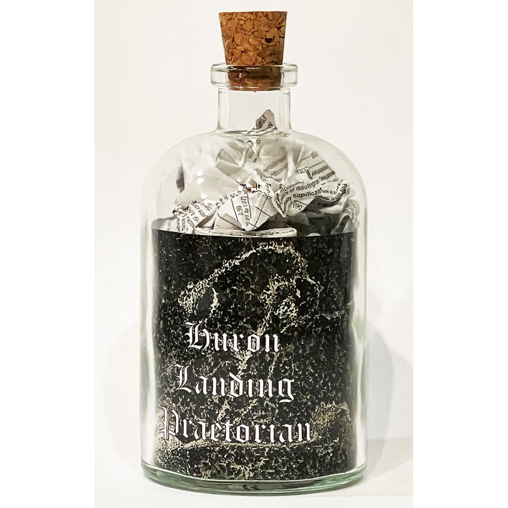 <br/>Huron Landing Praetorian, 10/9/2025<br/>Apx 6½" x 3" x 3"<br/>glass, paper, ink and cork